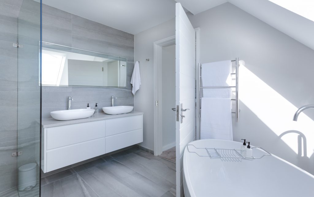 white bathroom with double sinks