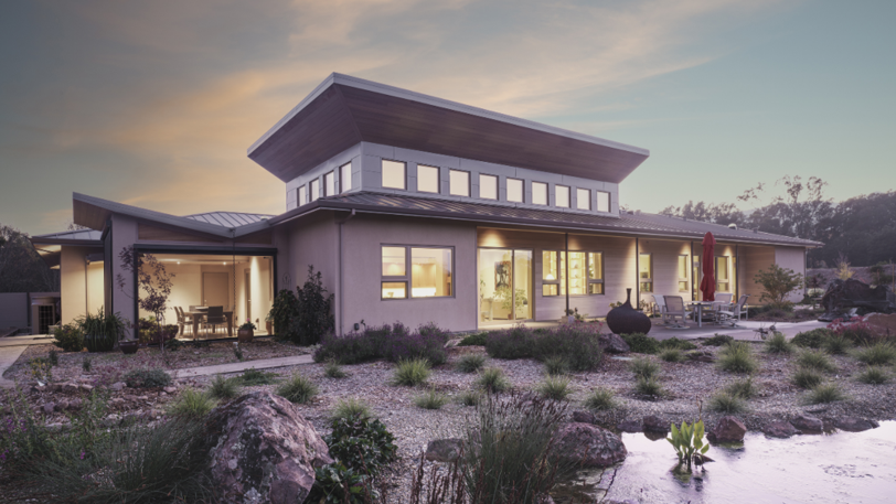 A luxury home constructed in Santa Rosa with large windows.